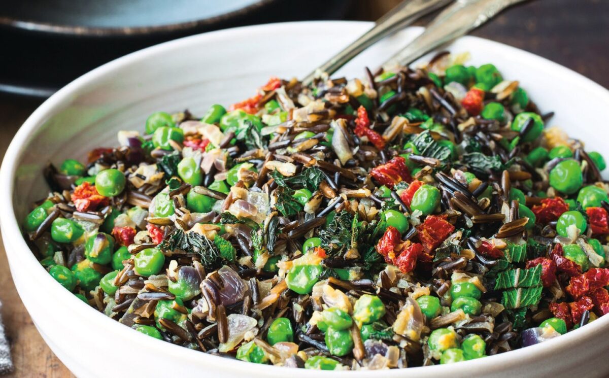 Black rice with peas, onions, sun-dried tomatoes and mint leaves