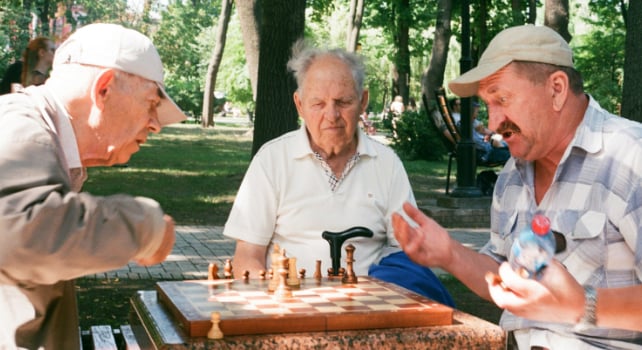 man playing chess socially