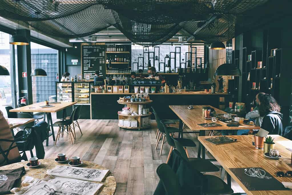 Cozy coffee shop with almost empty seats