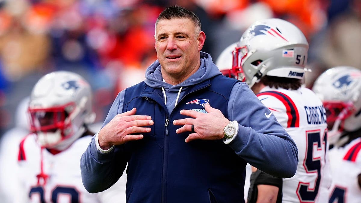 New England Patriots head coach Mike Vrabel on the field at Mile High's Empower Field.