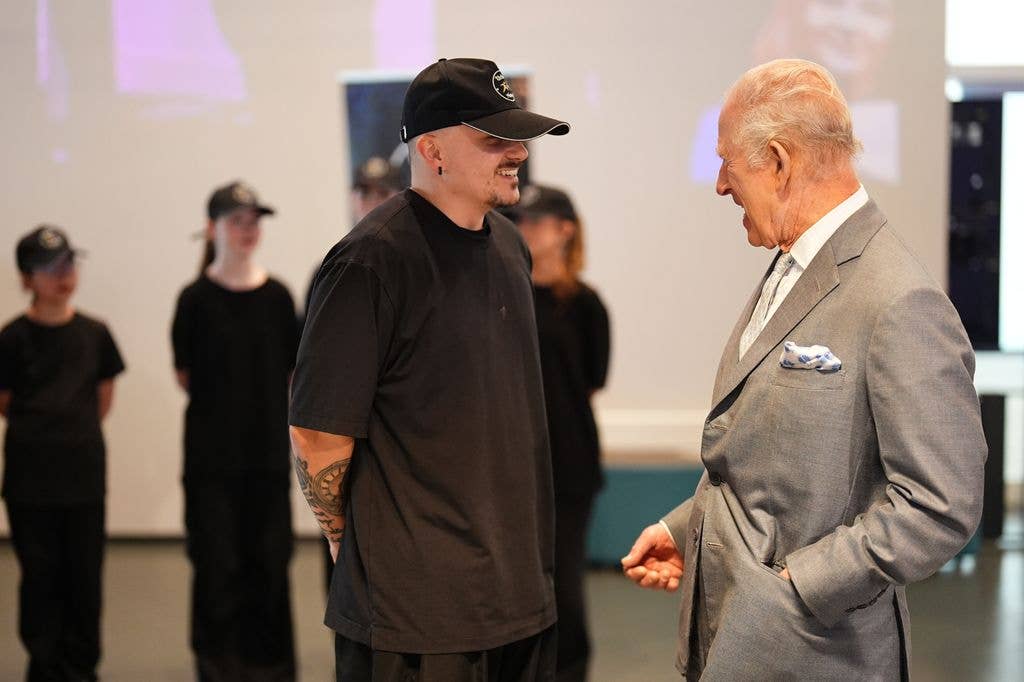King Charles III speaks to Jamie Fagan, founder of Urban Motion and former ambassador of the King's Trust.